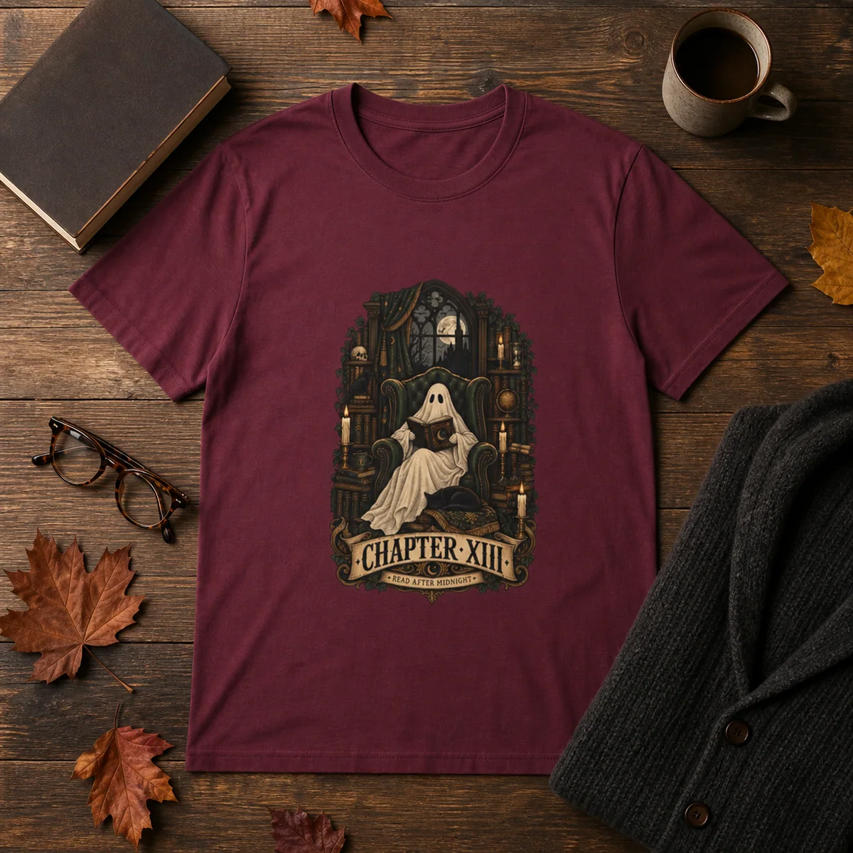 A maroon Ghost Reading Book T-shirt styled with a cardigan, book, glasses and a plain mug